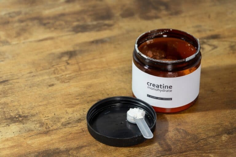 Creatine monohydrate powder, a popular supplement that gave rise to hair loss concerns.