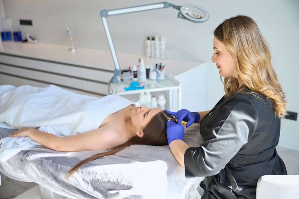 Patient receiving PRP after evaluating PRP vs FSE for hair loss options